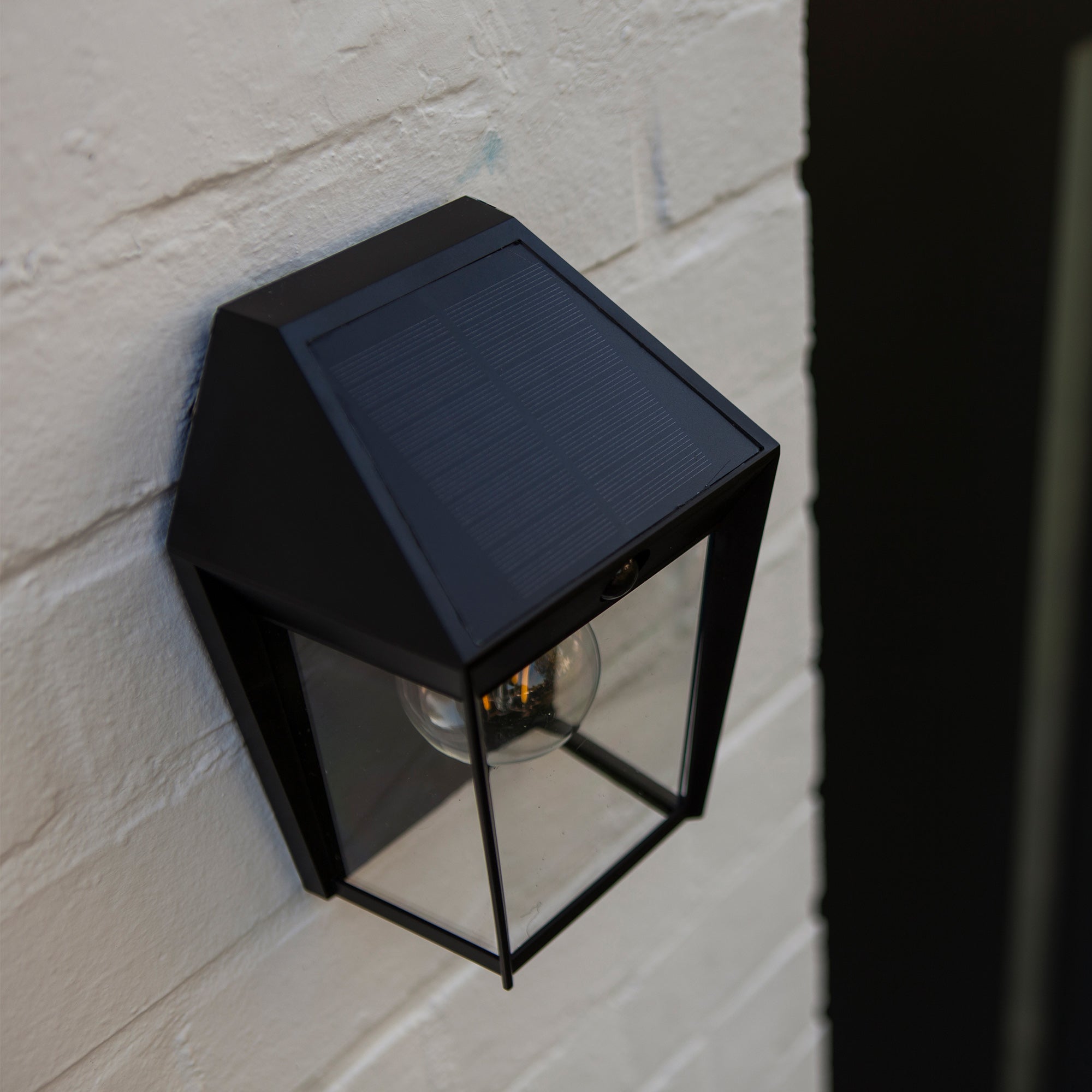 AVONY solarna zidna svjetiljka, senzor pokreta, mat crna, 1xE27, 2700K, IP44, 205mm
