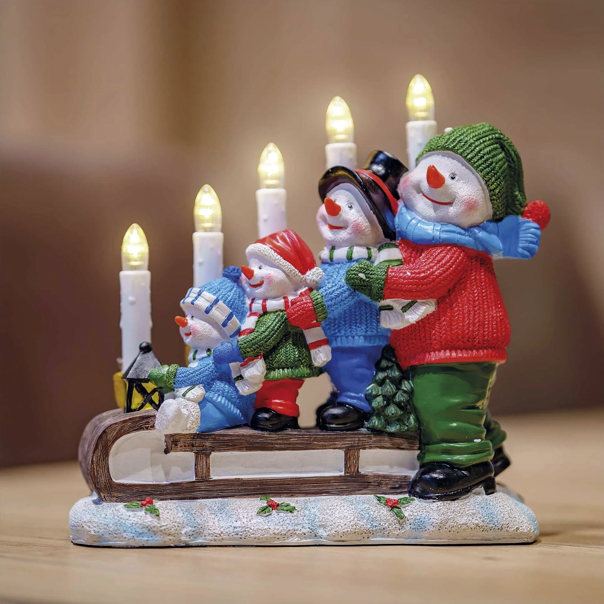 Božićni svijećnjak, snjegovići na saonicama, LED, toplo bijela, 2xAA, IP20