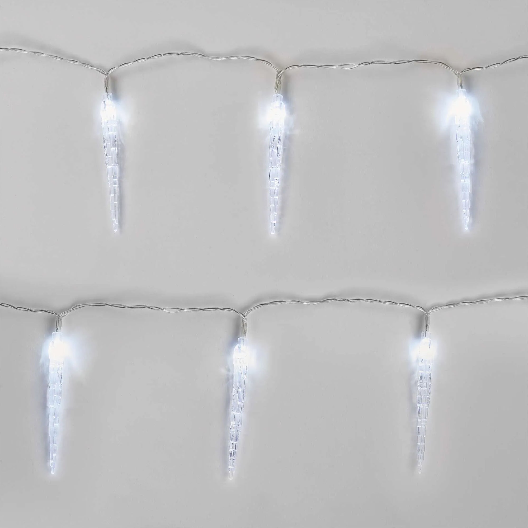 LED Christmas garland, 10 icicles, indoor, cool white, timer, 2xAA, 1.35m