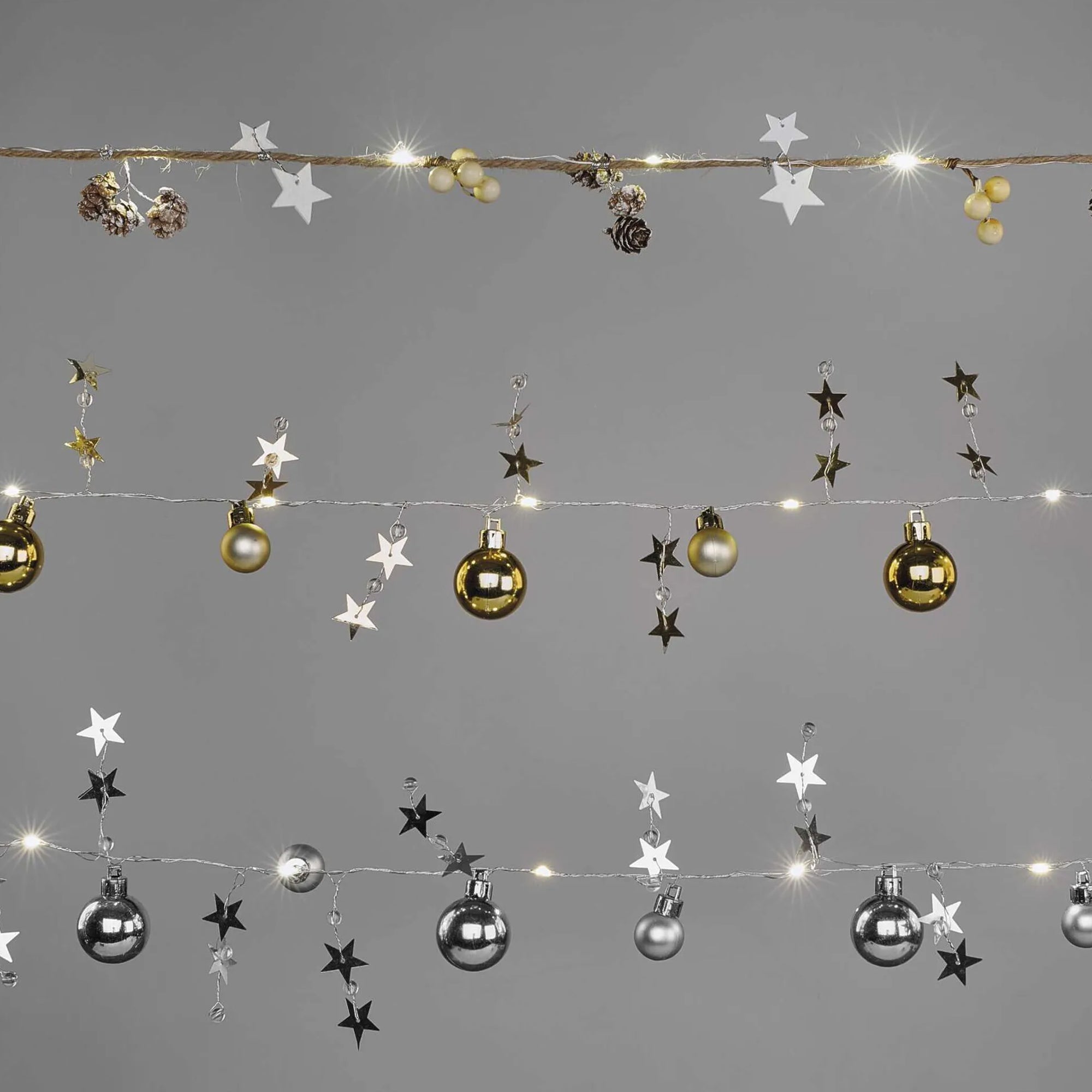 LED Christmas garland, cones, indoor, warm white, 2xAA, 1.7m