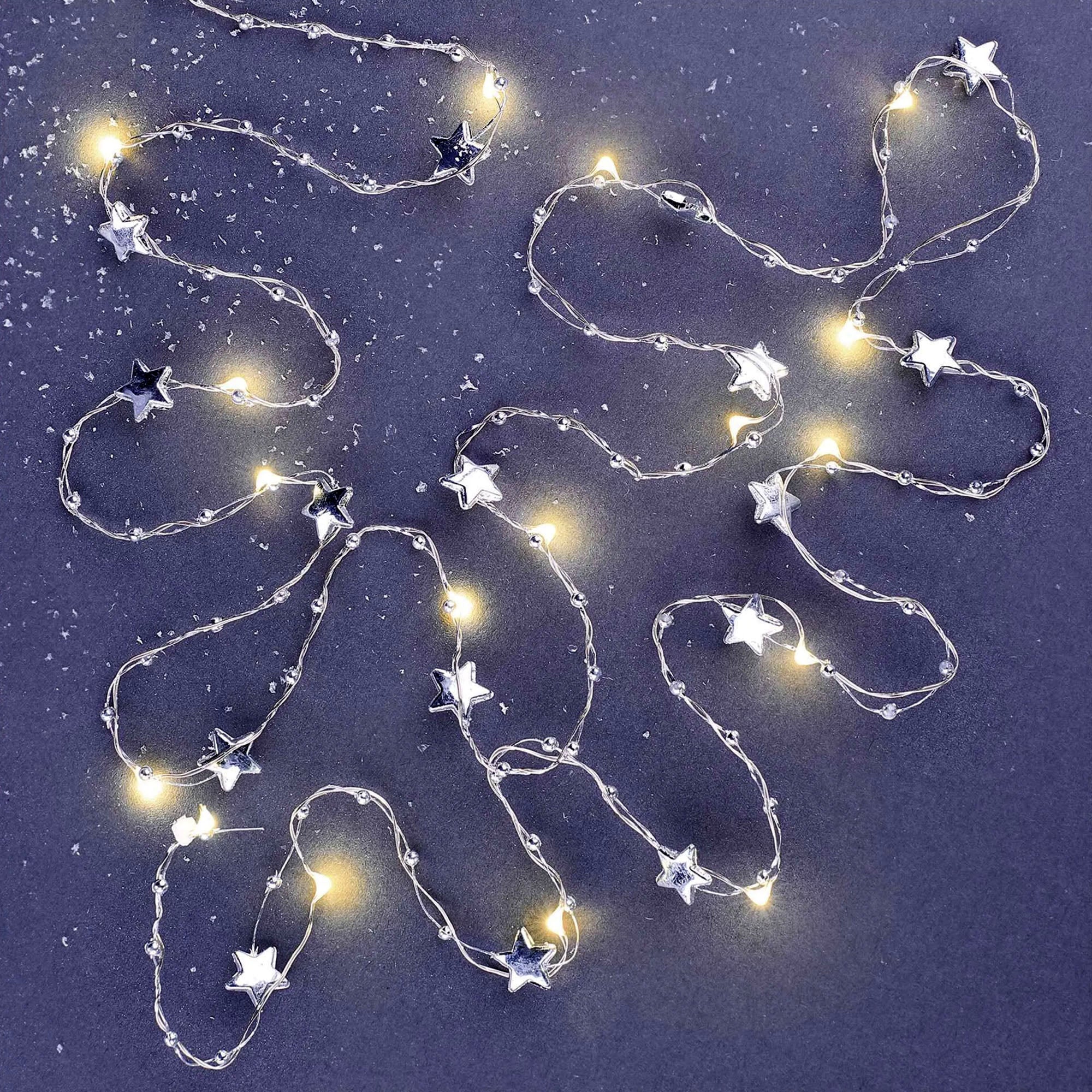LED Christmas string, stars, indoor, silver, warm white, timer, 2xAA, 1.9m